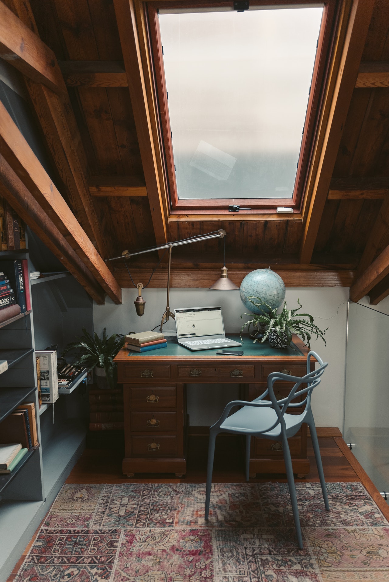 Desk in the attic with a skylight
